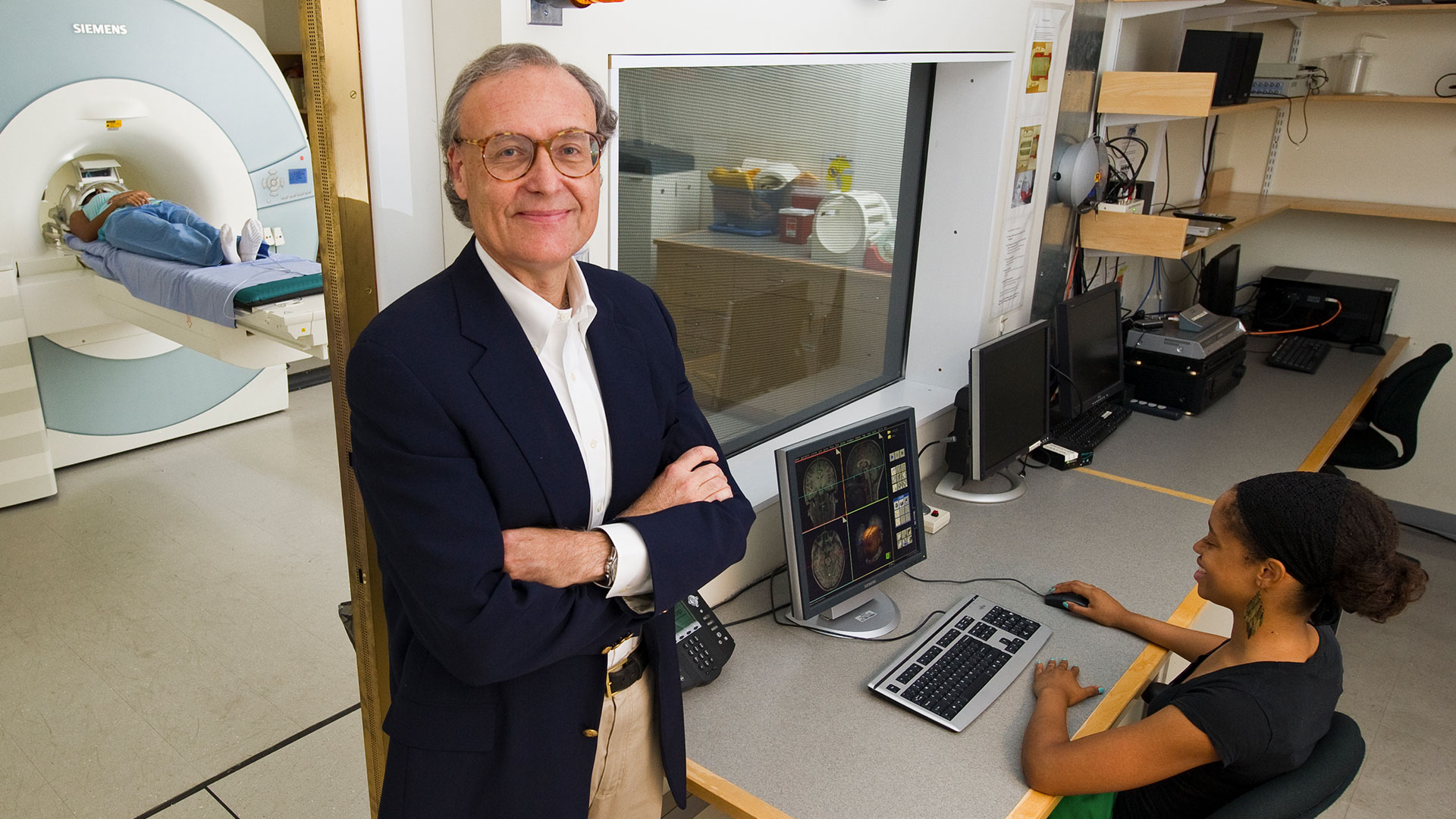 Gabrieli standing in imaging center