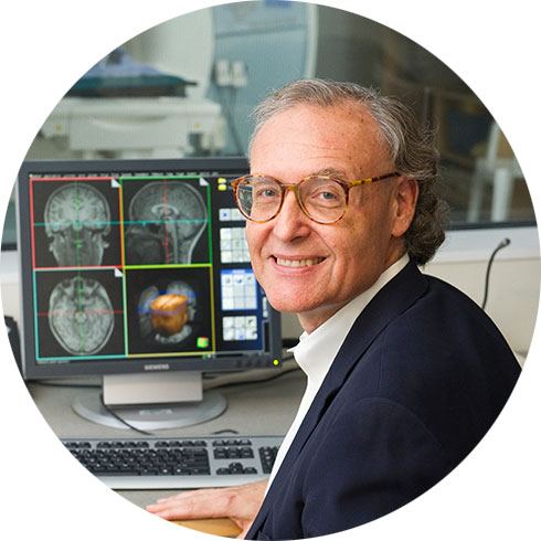 Researcher sitting in front of computer