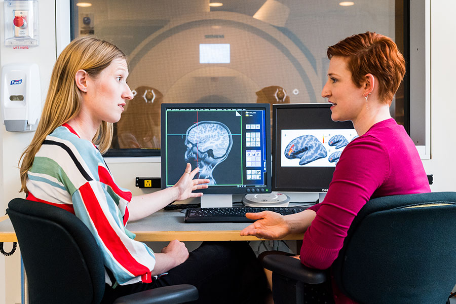 Two McGovern scientists collaborate on research in the Martinos Imaging Center.