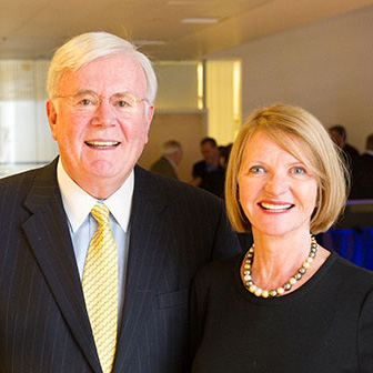 Man and woman smiling at camera